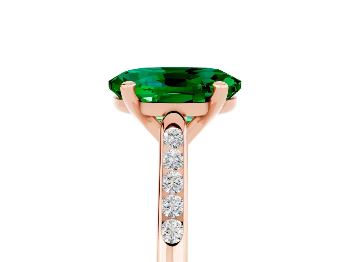 Oval Cut Emerald Solitaire Ring with Channel Set Round Band and Prong Setting Rose gold