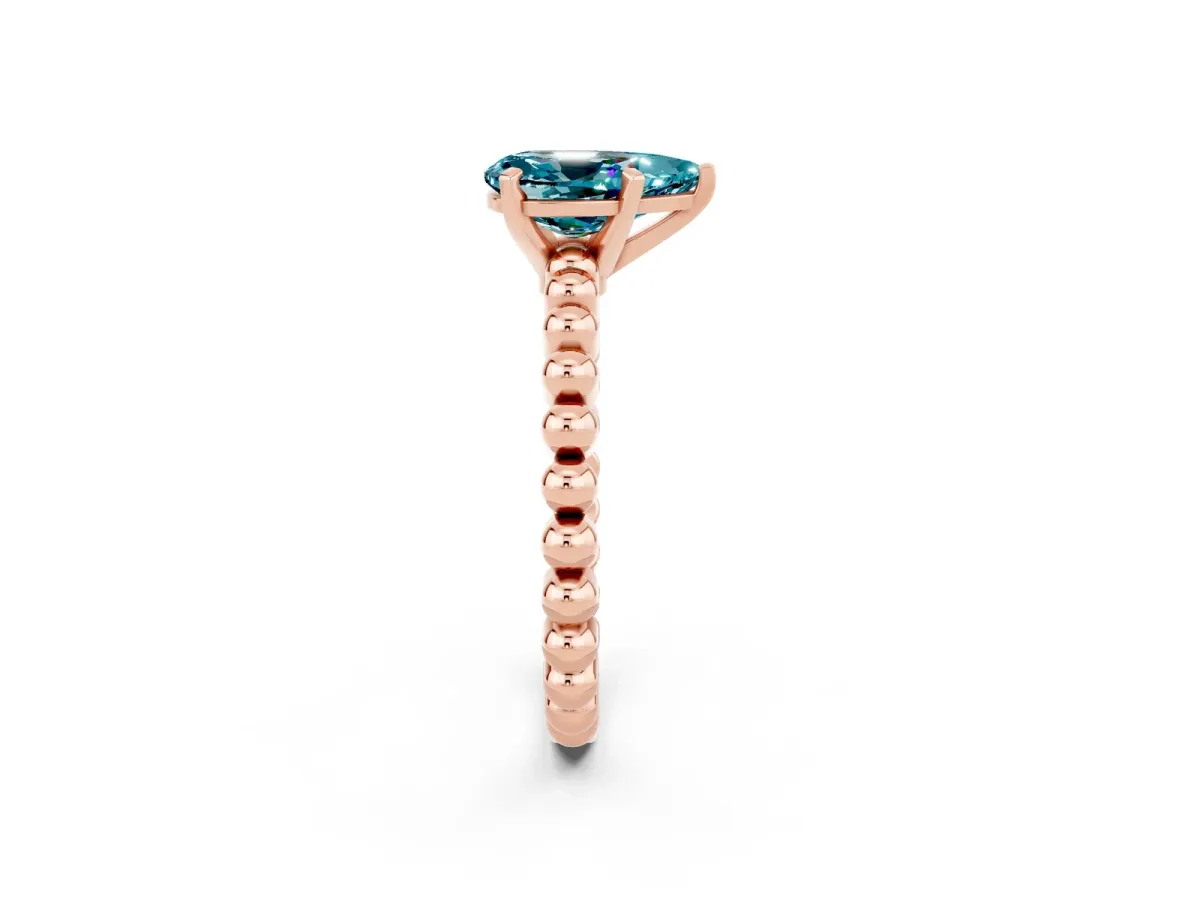 Pear Cut Blue Topaz Solitaire Ring with Beaded Band and Prong Setting Rose gold