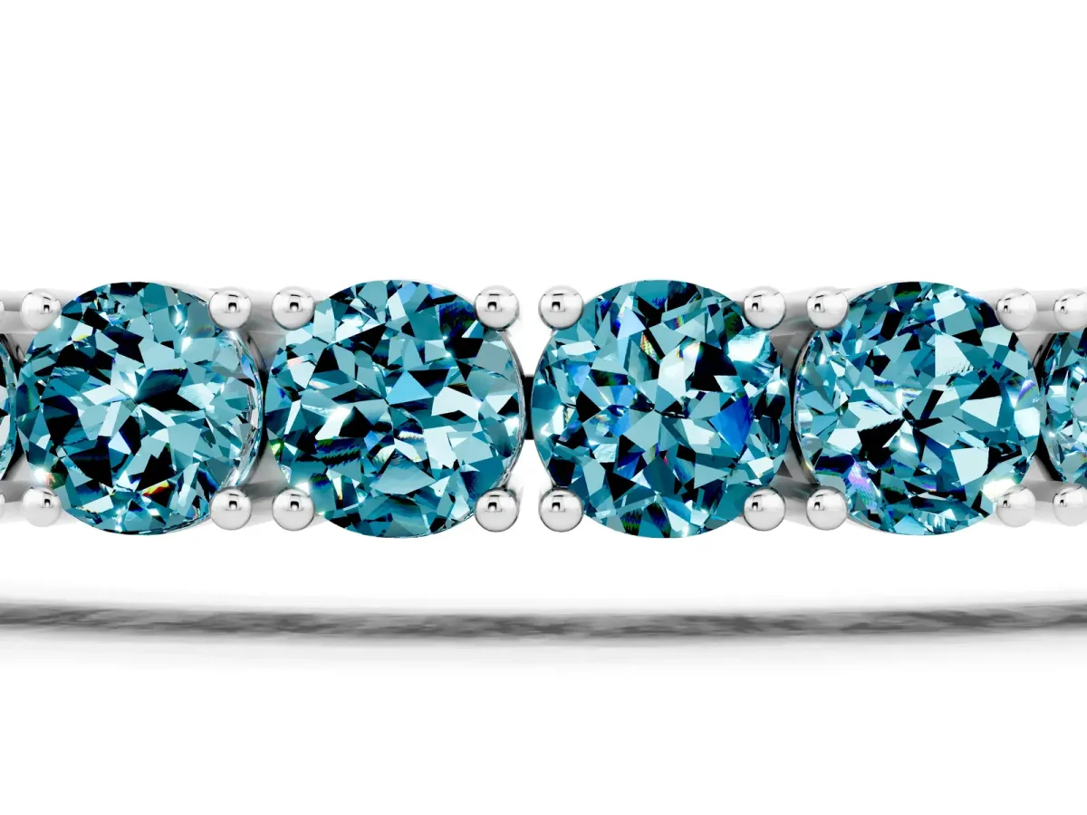 Round Brilliant Blue Topaz Tennis Bracelet with Prong Setting Silver