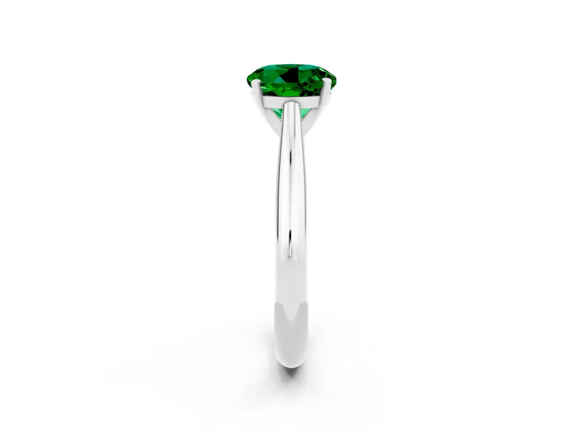 Round Cut Emerald Solitaire Engagement Ring with Cathedral Setting and Four-Prong Mount White gold