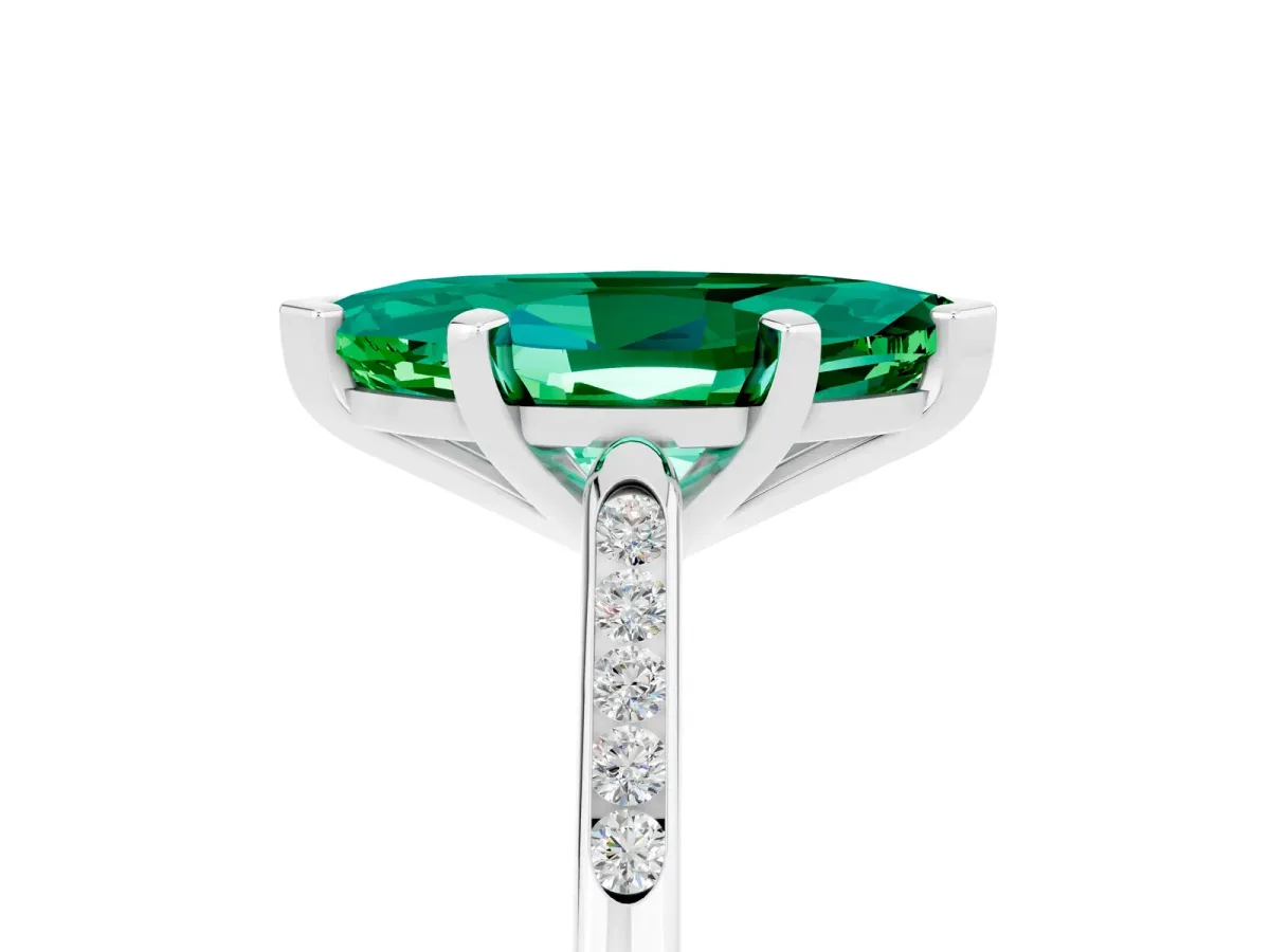Marquise Cut Emerald Solitaire Ring with Channel Set Round Band and Prong Setting Silver