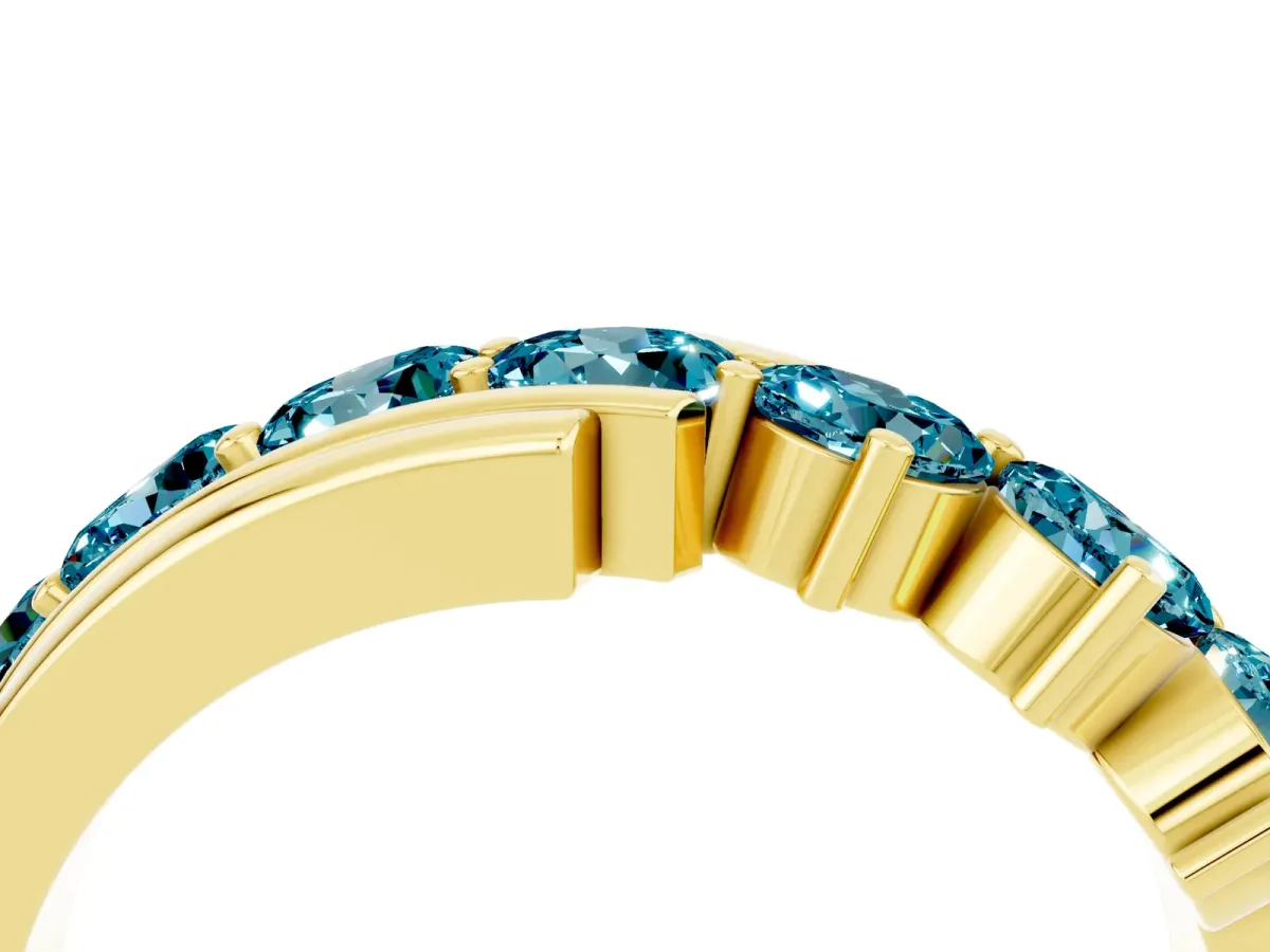 Round Blue Topaz Wave Band with Channel and Shared Prong Setting Yellow gold