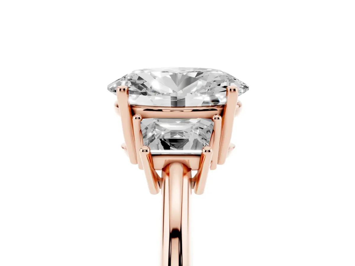 Oval Cut Diamond Three-Stone Ring with Trapezoid Side Stones and Prong Setting Rose gold