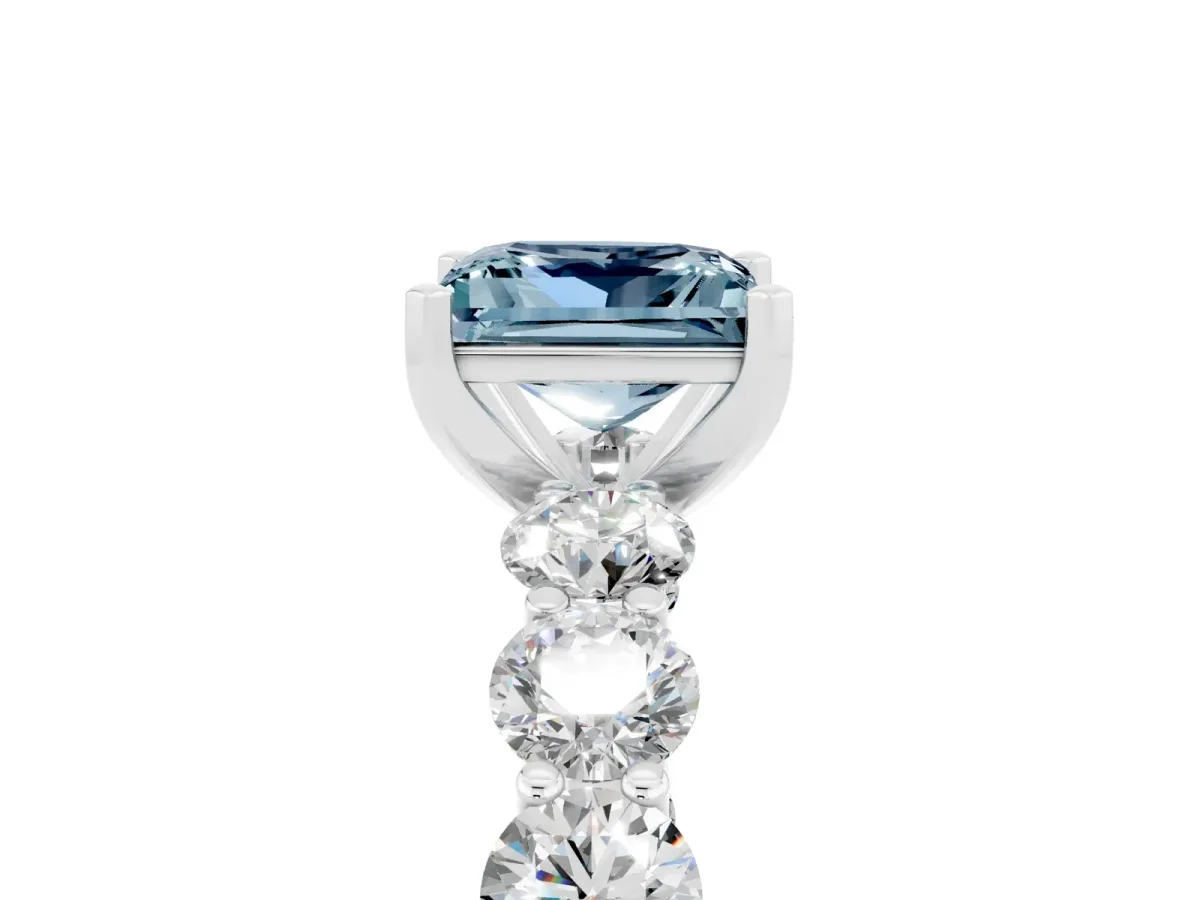 Princess Cut Aquamarine Prong Setting with Side Stones on a Pave Band Silver