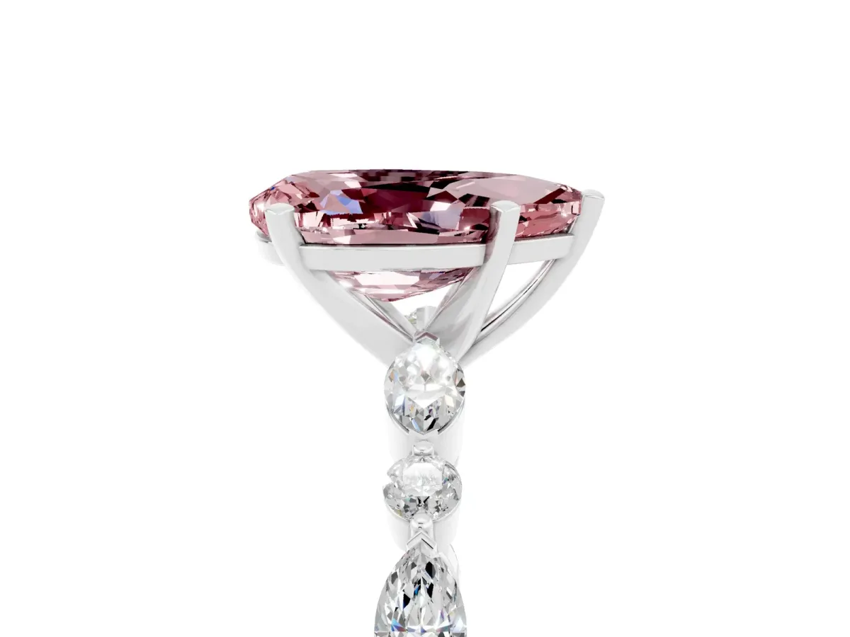 Pear Cut Morganite Ring with Marquise and Round Side Stones and Four-Prong Setting Silver