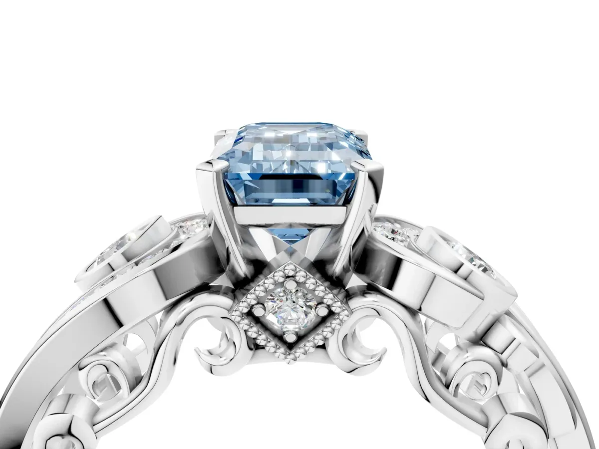Fancy Blue Emerald Cut Diamond Solitaire Ring with Milgrain Pavé Band and Four-Prong Setting Silver