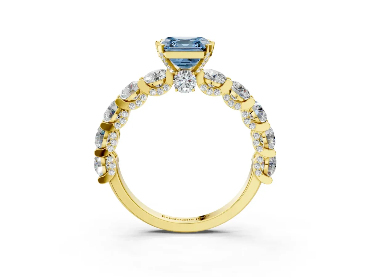 Fancy Blue Asscher Cut Diamond Side Stone Engagement Ring with Four-Prong Setting Yellow gold