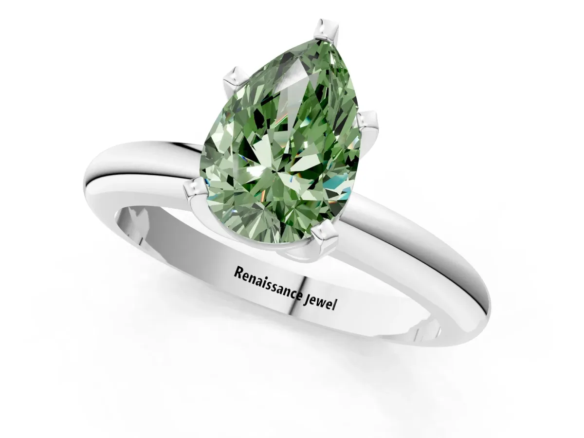 Fancy Green Pear Cut Diamond Solitaire Engagement Ring with Round Band and Four-Prong Setting Silver