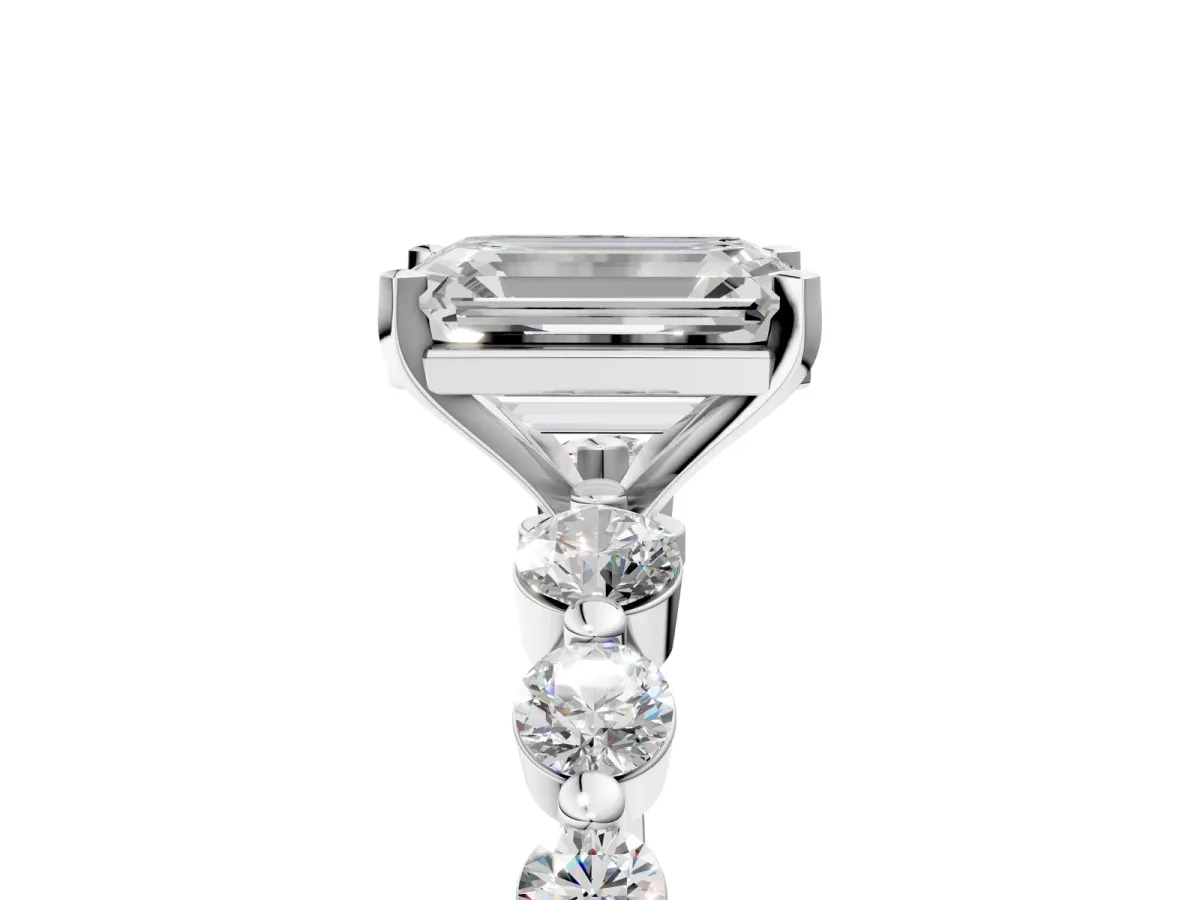 Emerald Cut Solitaire Diamond Ring with Pave Band and Four-Prong Setting White gold