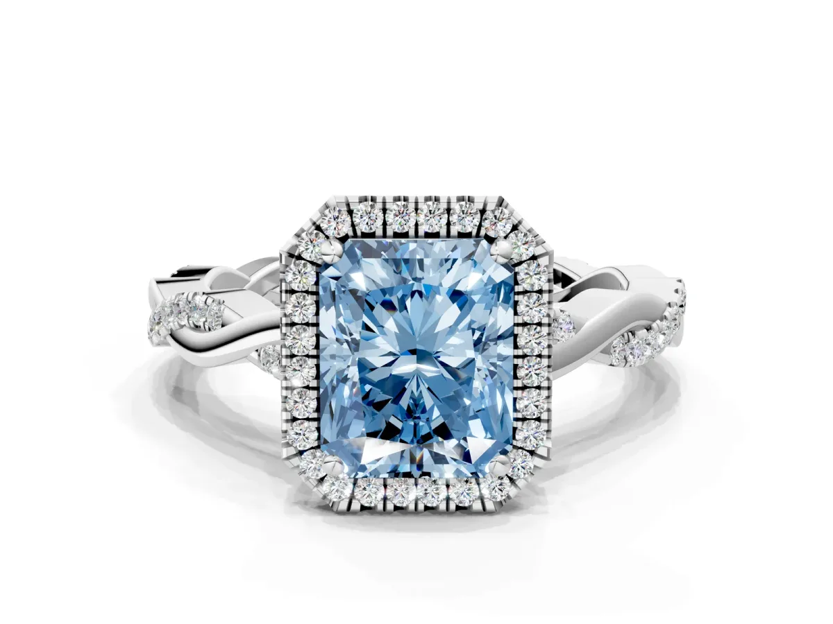 Fancy Blue Radiant Cut Cut Halo Twisted Band Four-Prong Ring Platinum
