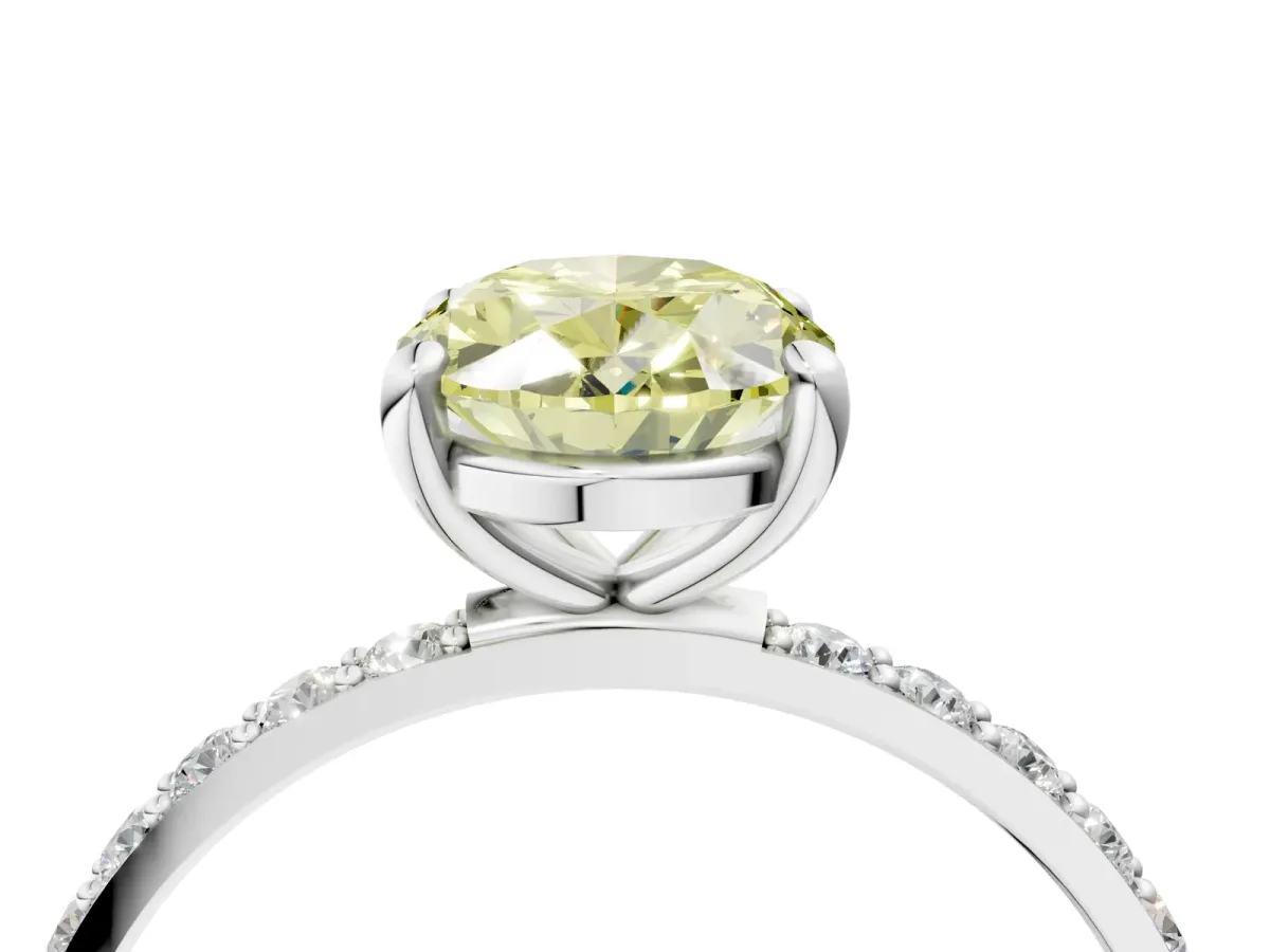 Fancy Yellow Oval Cut Diamond Solitaire Ring with Round Pavé Band and Prong Setting Silver