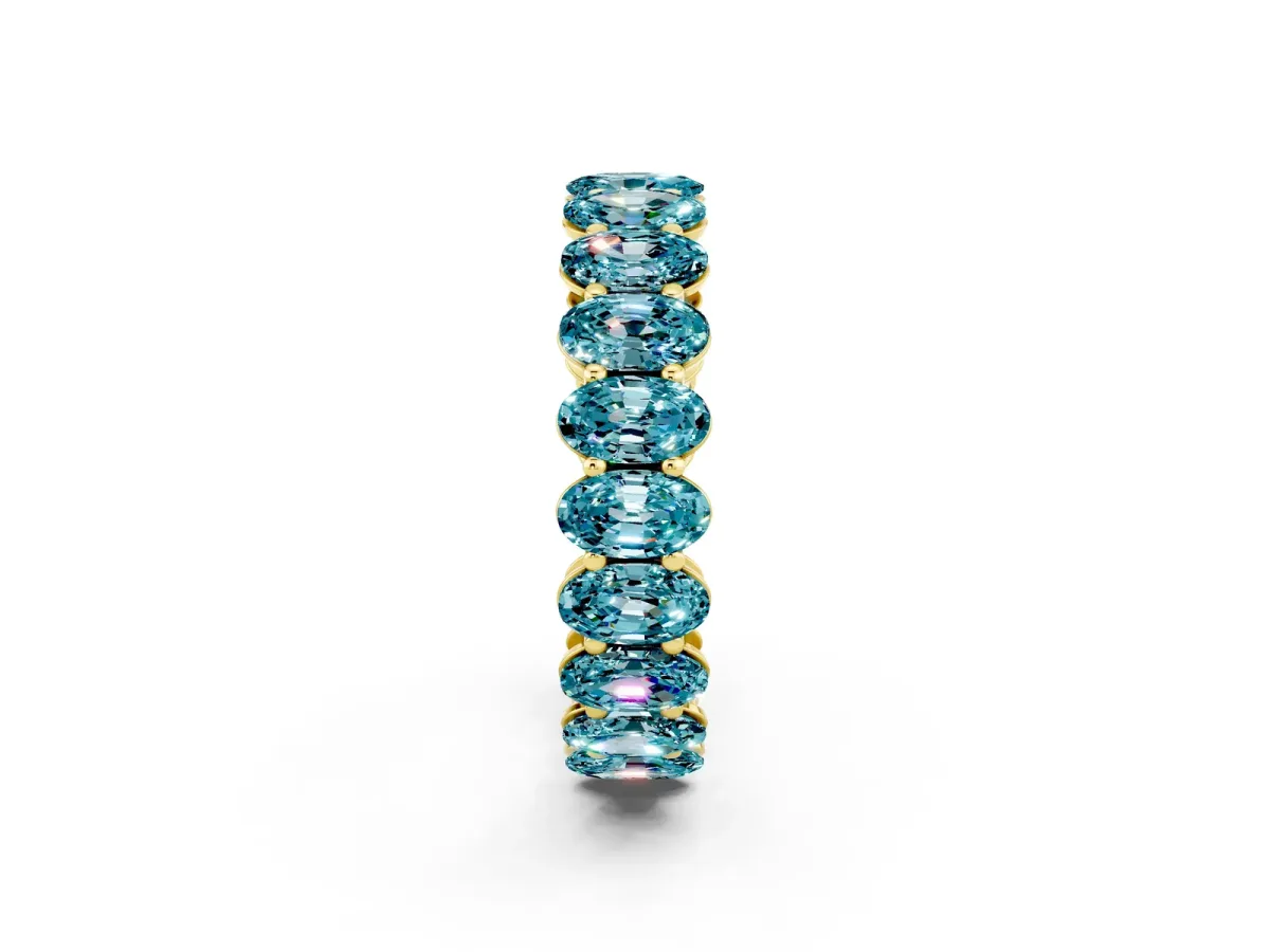 Oval Cut Blue Topaz Eternity Band with Shared Prong Setting Yellow gold