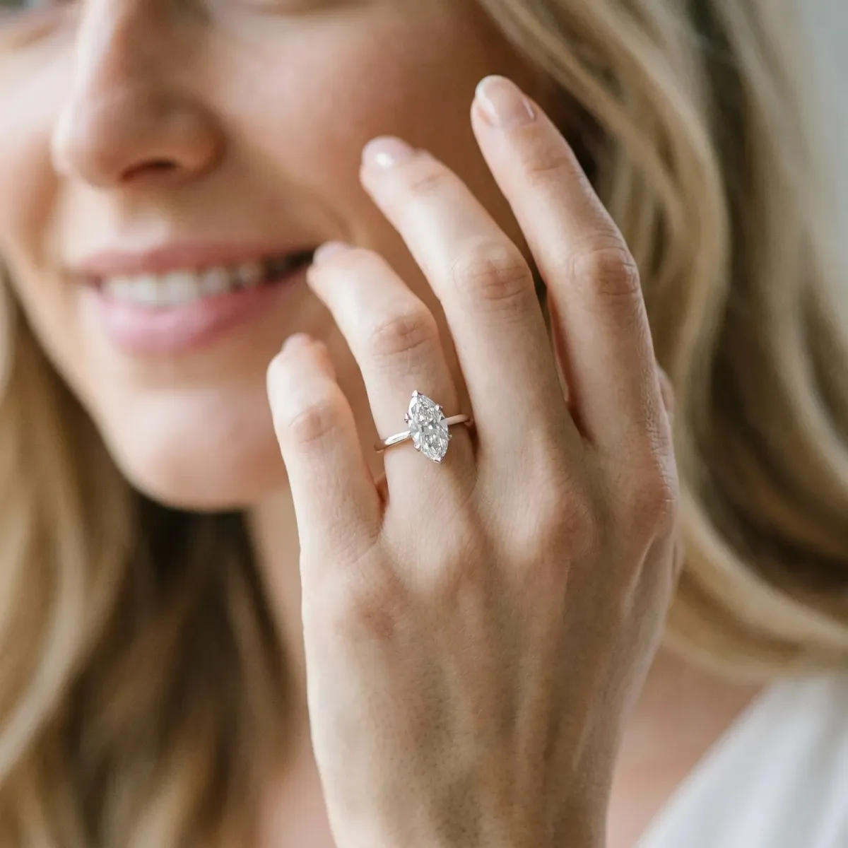 Marquise Cut Diamond Solitaire Ring with Flower Prong Setting and Classic Band Silver