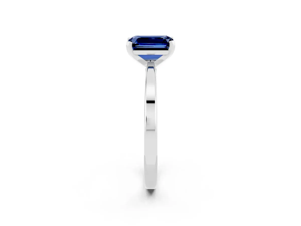 Emerald Cut Blue Sapphire Solitaire Engagement Ring with Classic Band and Four-Prong Setting Silver