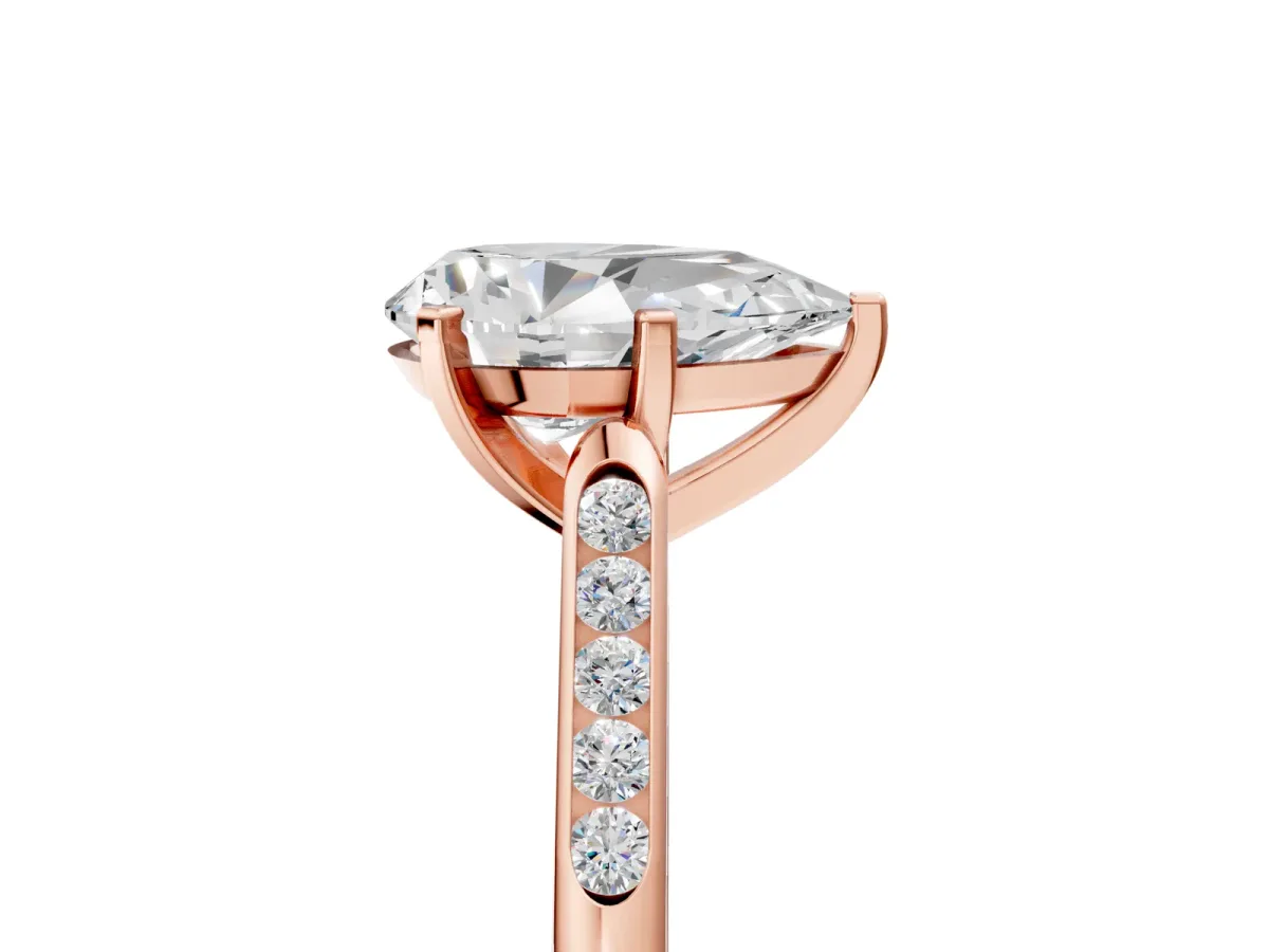 Pear Cut Diamond Solitaire Ring with Channel Set Round Band and Prong Setting Rose gold