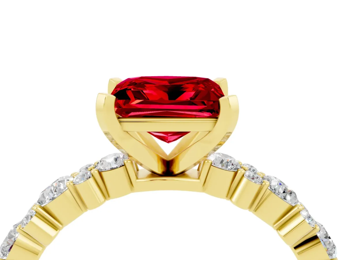 Princess Cut Ruby Side Stone Solitaire Ring with Round and Four-Prong Setting Yellow gold