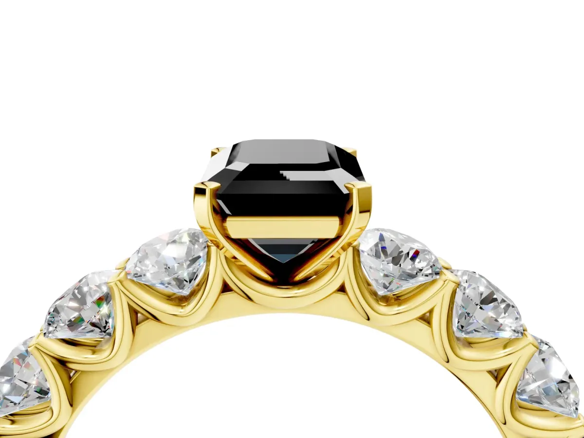 Fancy Black Emerald Cut Diamond Prong Setting with Side Stones on a Pave Band Yellow gold