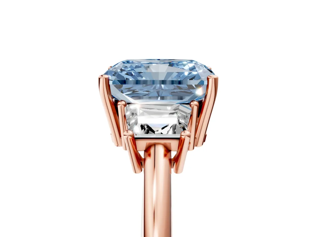 Fancy Blue Radiant Cut Diamond Three-Stone Ring with Trapezoid Side Stones and Prong Setting Rose gold