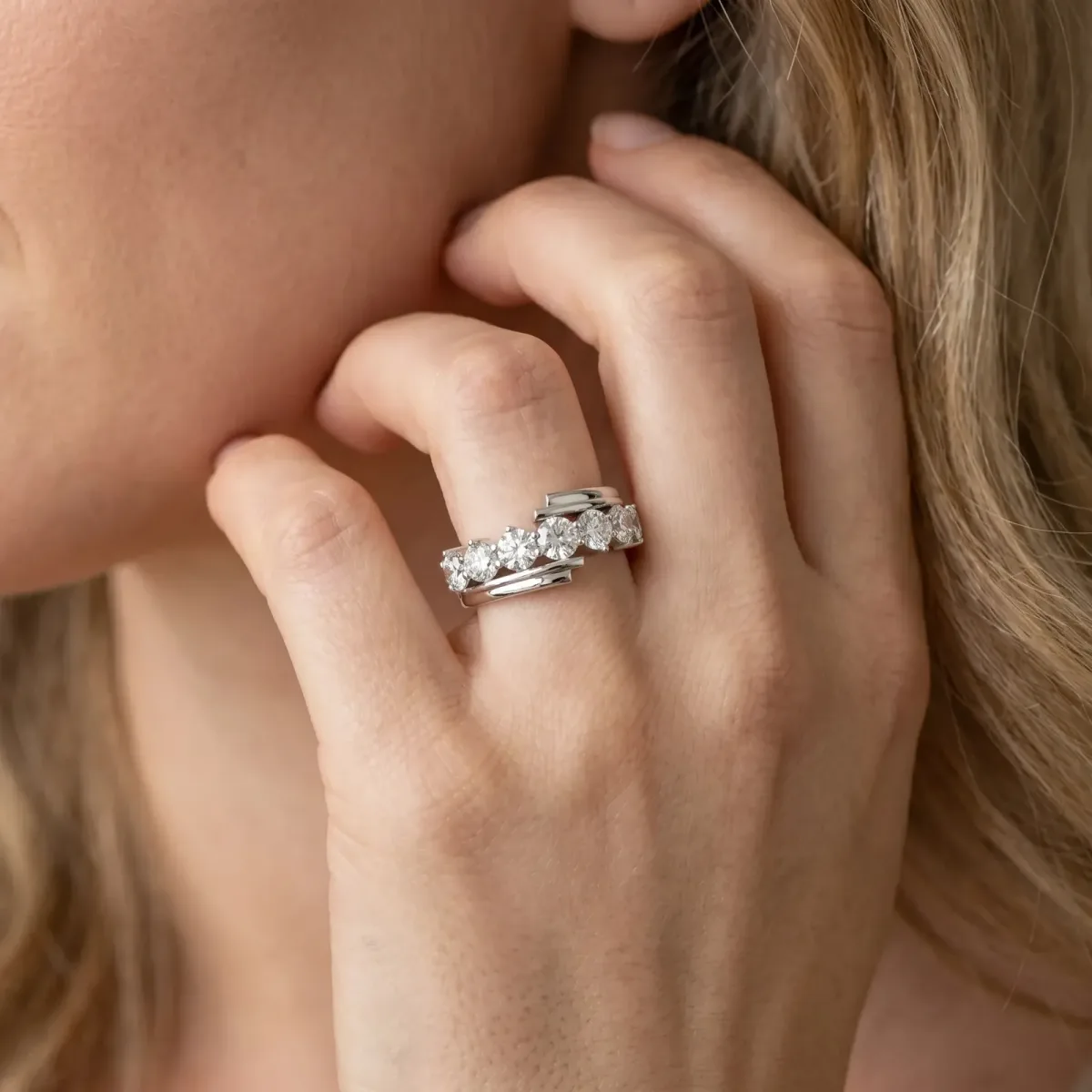 Round Diamond Wave Band with Channel and Shared Prong Setting Platinum