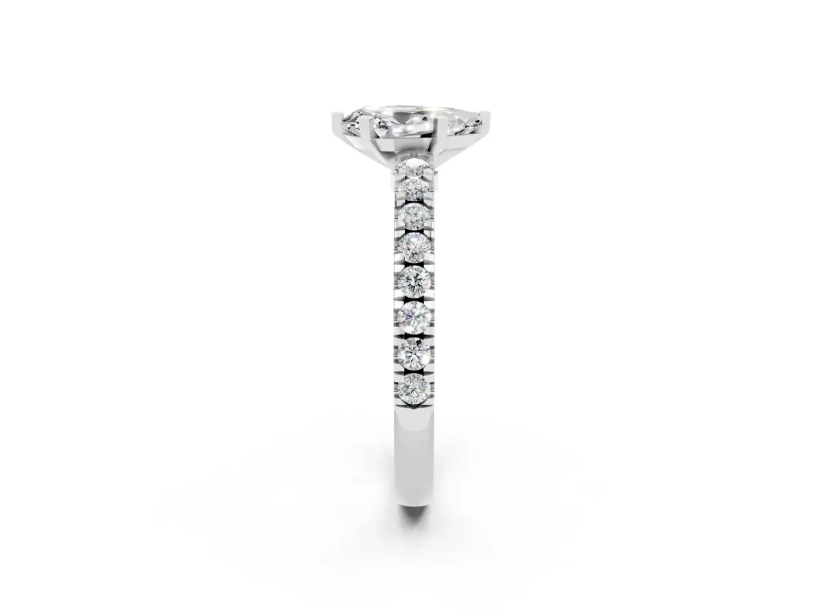 Pear Cut Solitaire Moissanite with Pavé Band and Four-Prong Setting Silver