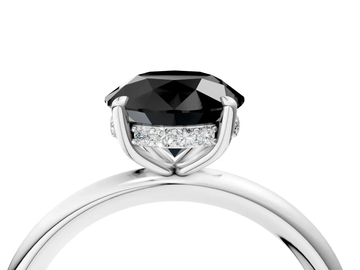 Fancy Black Round Cut Diamond Solitaire Ring with Thin Band and Four-Prong Setting Silver