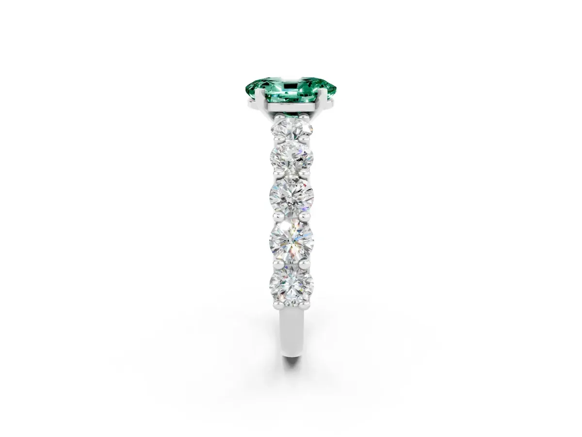 Oval Cut Green Sapphire Prong Setting with Side Stones on a Pave Band Platinum