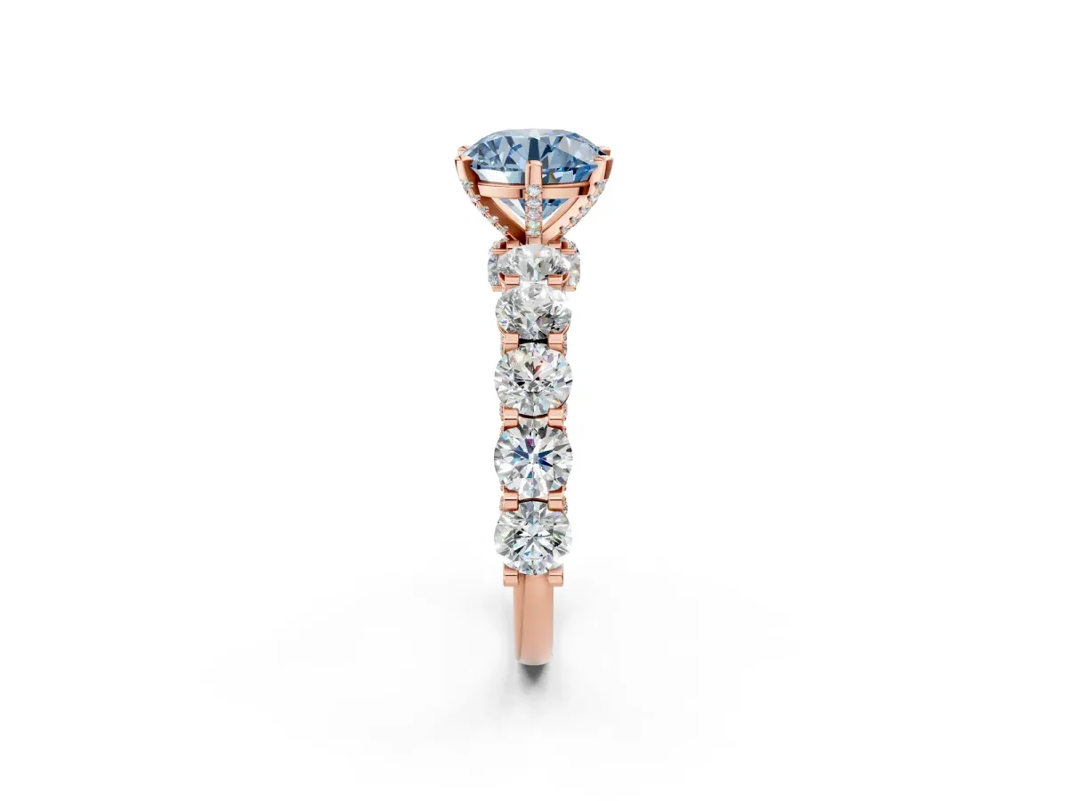 Fancy Blue Round Cut Diamond Side Stone Engagement Ring with Four-Prong Setting Rose gold
