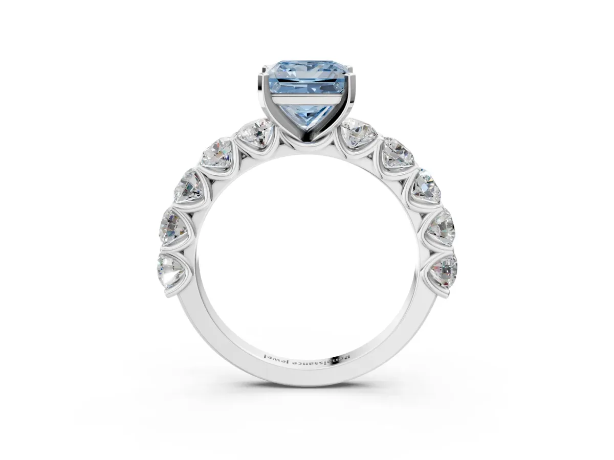 Fancy Blue Princess Cut Diamond Prong Setting with Side Stones on a Pave Band Silver