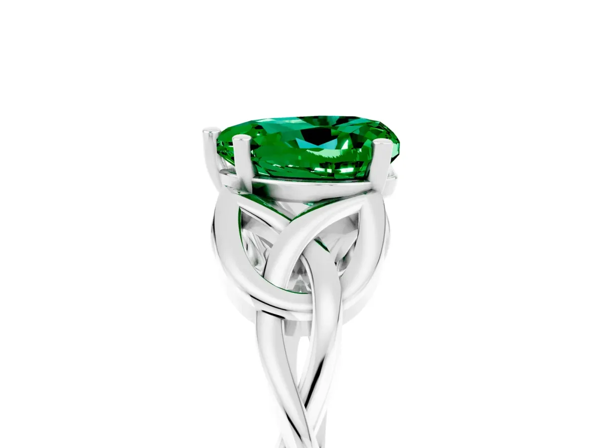 Heart Cut Emerald Solitaire Engagement Ring with Celtic Knot Band and Four-Prong Setting Silver