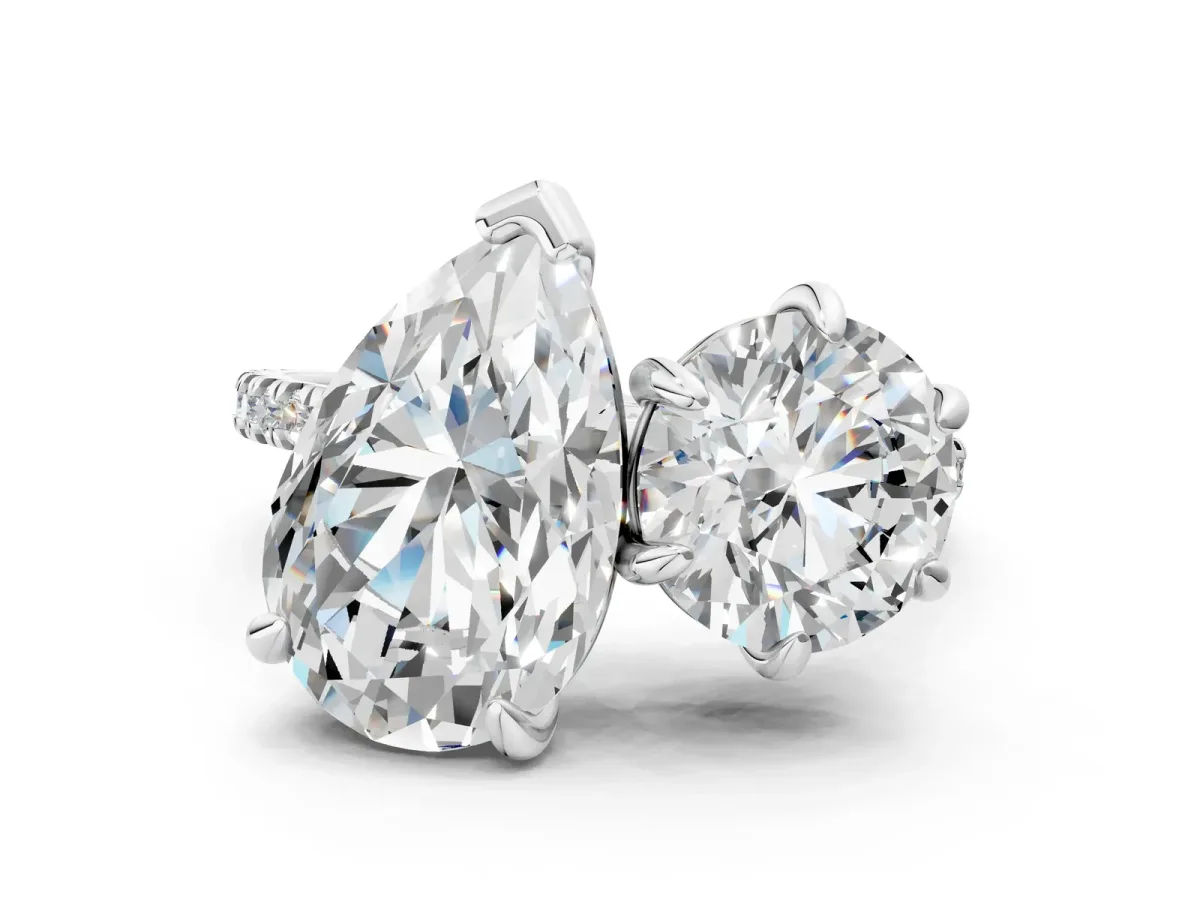 Round and Pear Toi Moi Ring with Prong Setting and Micro Pave Band Platinum
