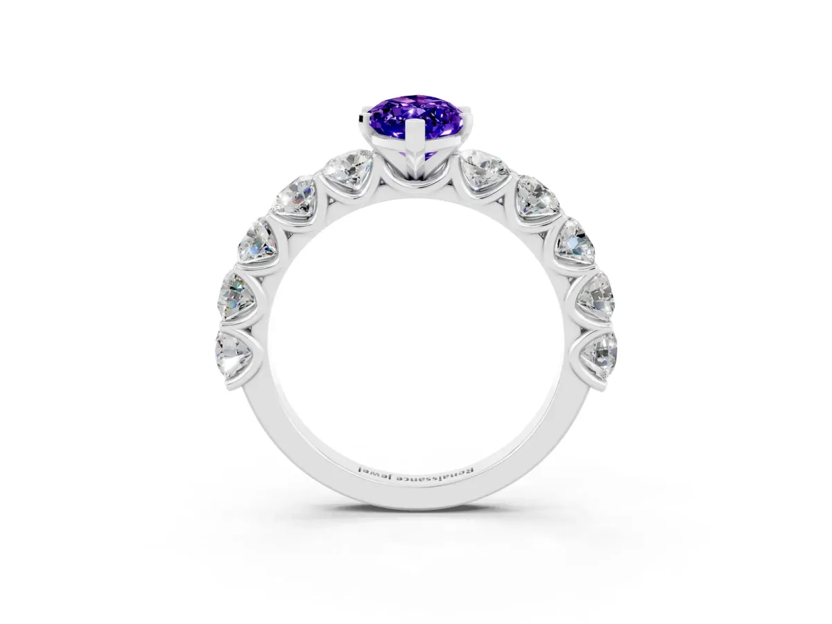 Marquise Cut Tanzanite Prong Setting with Side Stones on a Pave Band Silver