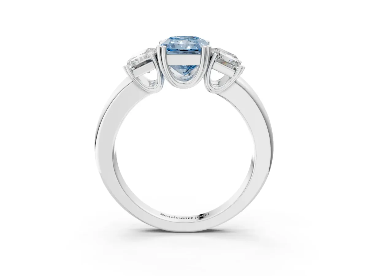 Fancy Blue Three-Stone Radiant Cut Cut Diamond Ring with Channel Set Band and Four-Prong Setting Silver