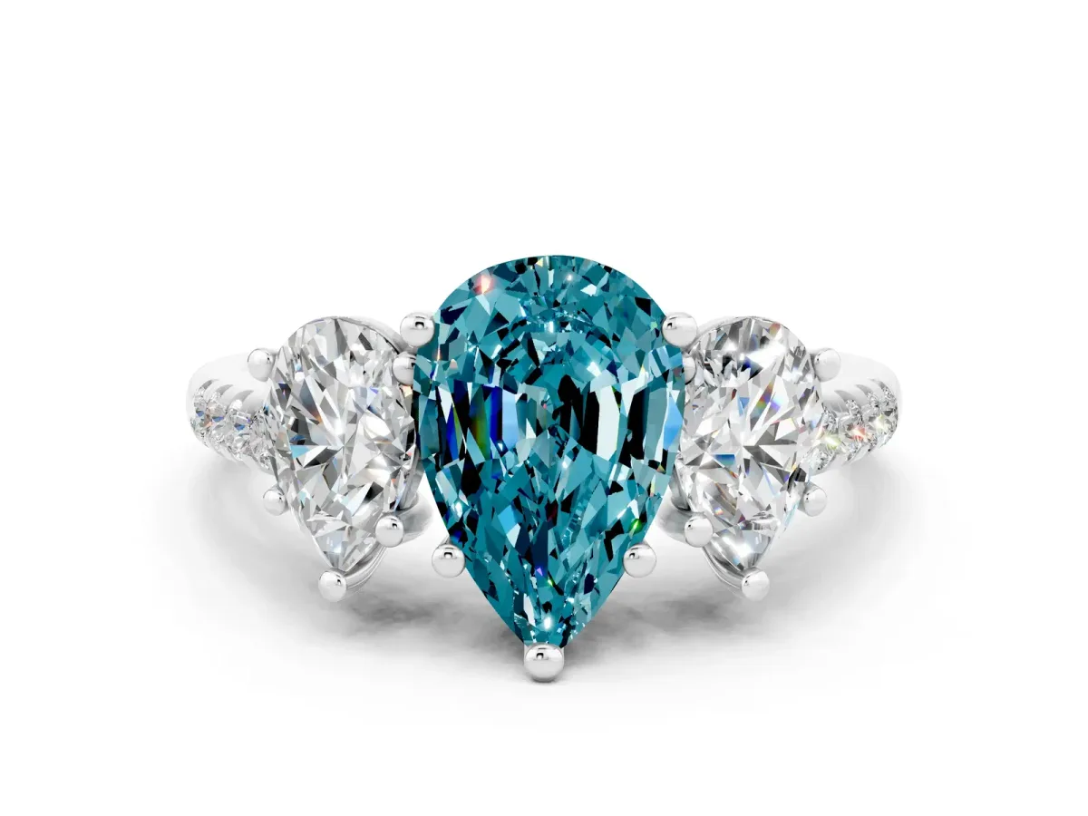 Three-Stone Pear Cut Blue Topaz Ring with Round Pavé Band and Prong Setting Silver