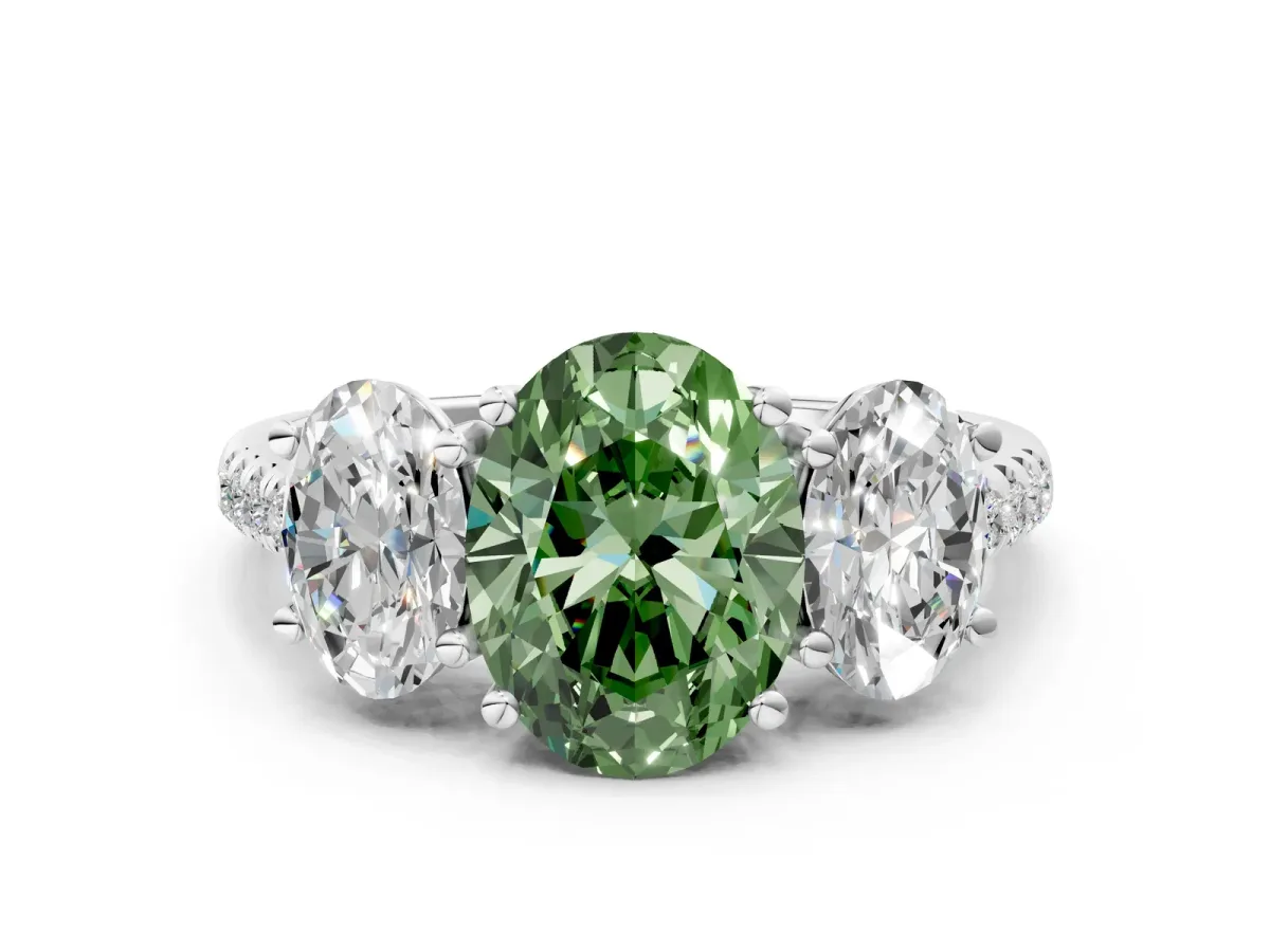 Fancy Green Three-Stone Oval Cut Diamond Ring with Round Pavé Band and Prong Setting Silver