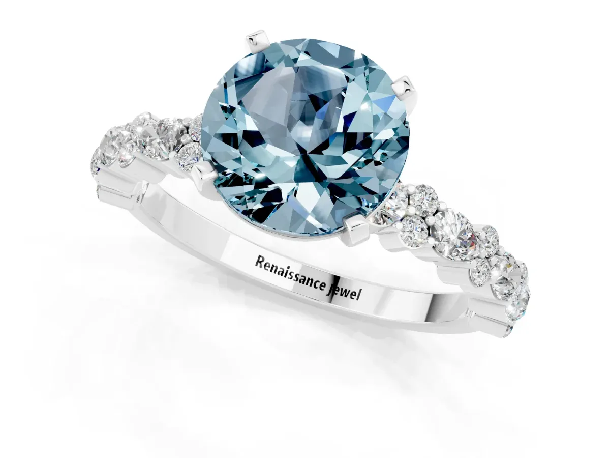 Round Cut Aquamarine Side Stone Solitaire Ring with Round and Four-Prong Setting Platinum