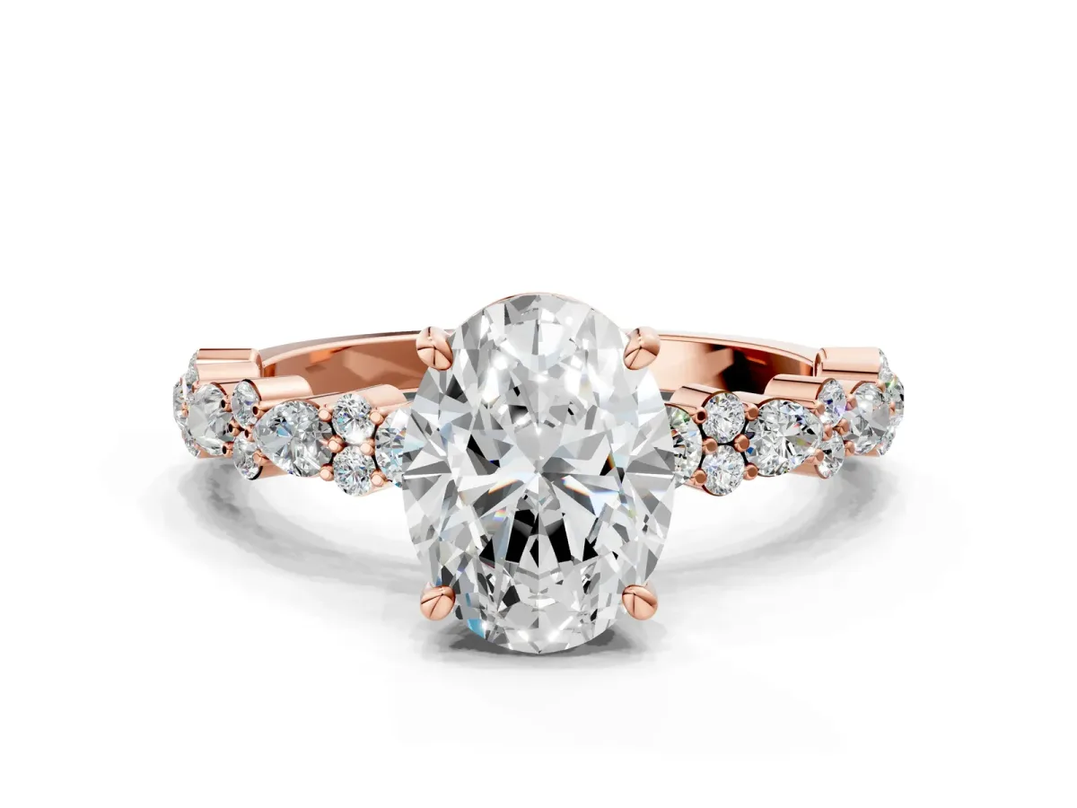 Oval Cut Diamond Side Stone Solitaire Ring with Round and Four-Prong Setting Rose gold