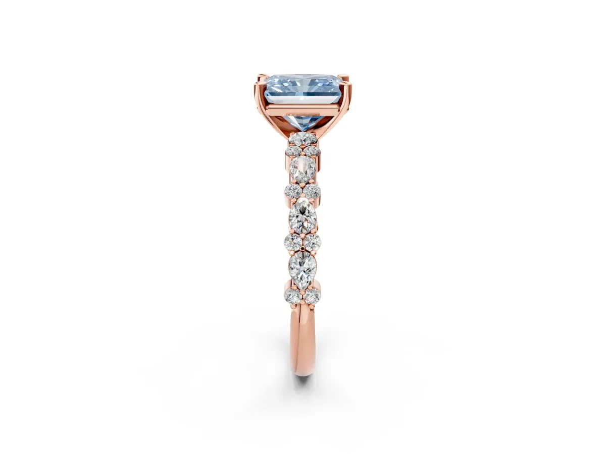 Fancy Blue Radiant Cut Diamond Side Stone Solitaire Ring with Round and Four-Prong Setting Rose gold