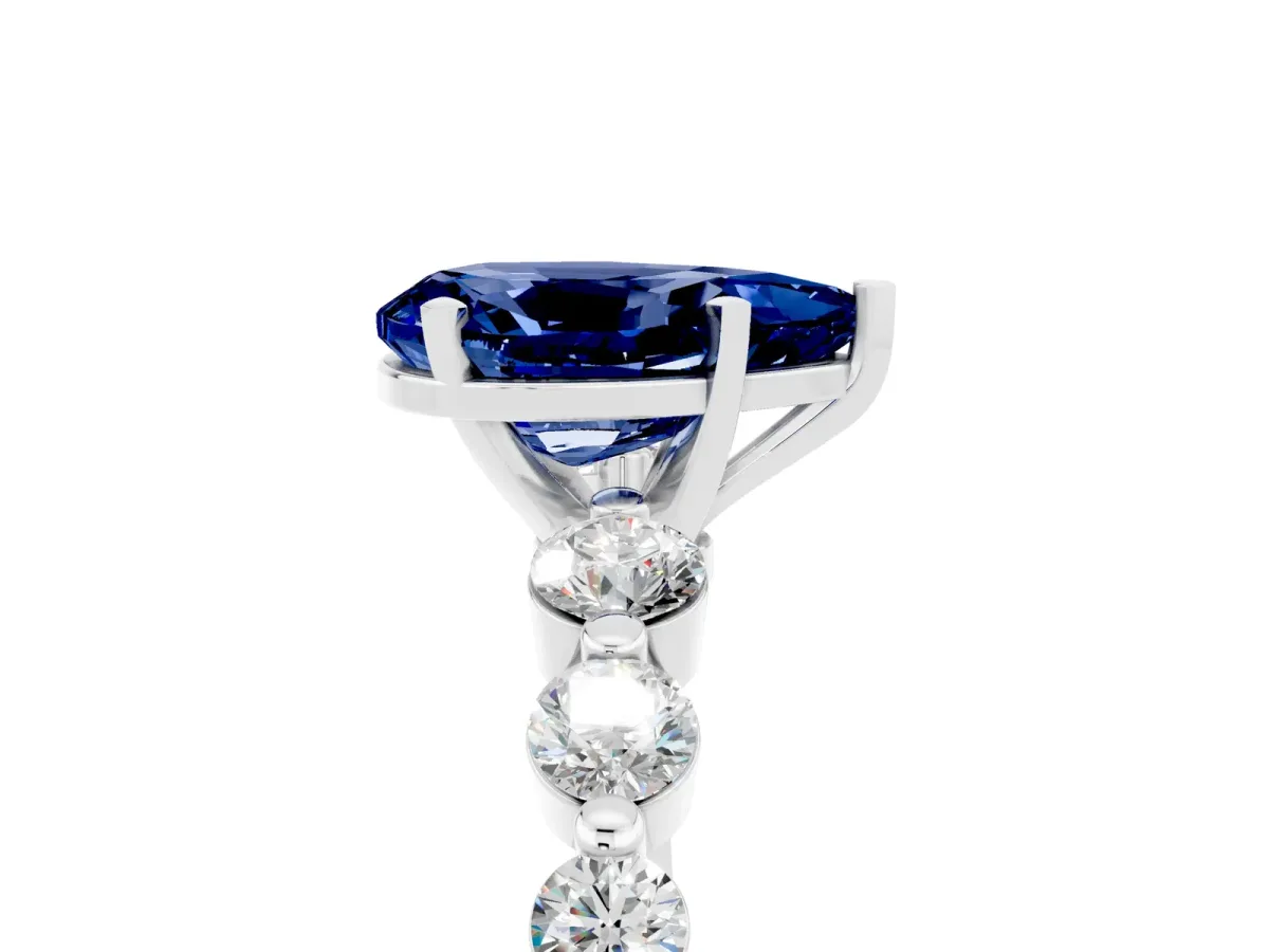 Pear Cut Solitaire Blue Sapphire Ring with Pave Band and Four-Prong Setting Platinum