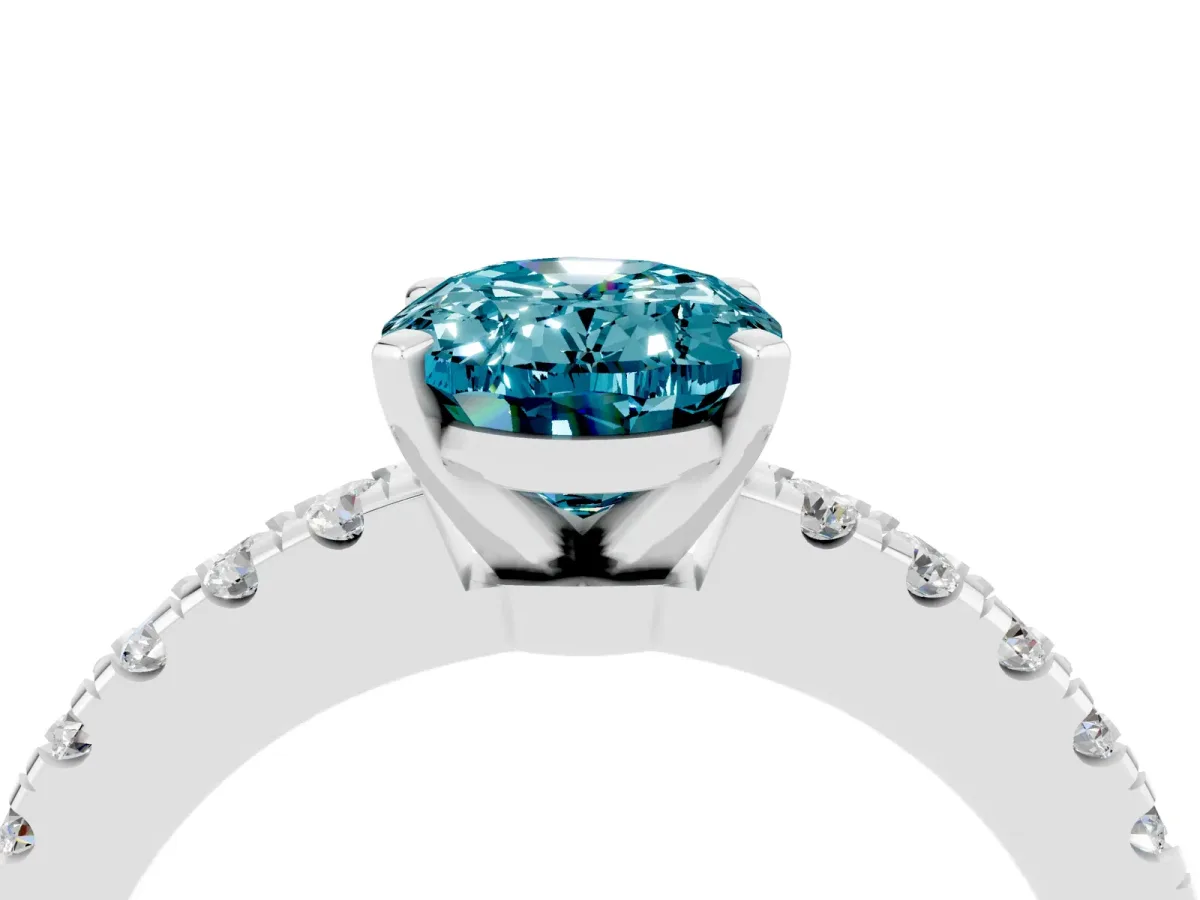 Oval Cut Solitaire Blue Topaz with Pavé Band and Four-Prong Setting Silver
