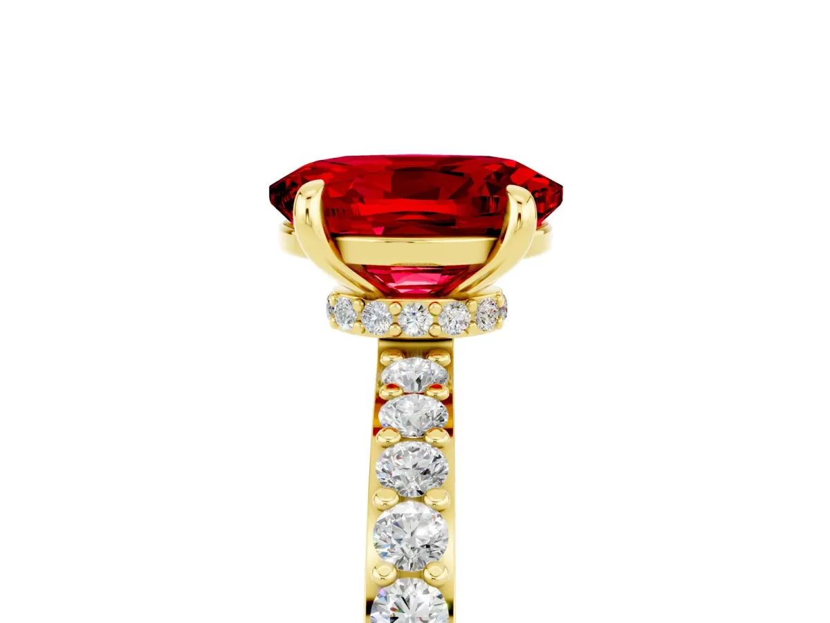 Oval Cut Ruby Solitaire Engagement Ring with Pavé Band and Four-Prong Setting Yellow gold