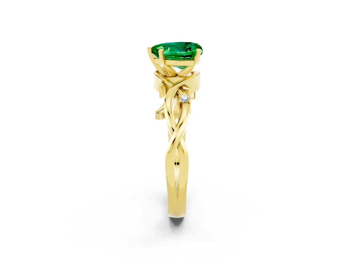Heart Cut Emerald Solitaire Ring with Twisted Band and Prong Setting Yellow gold