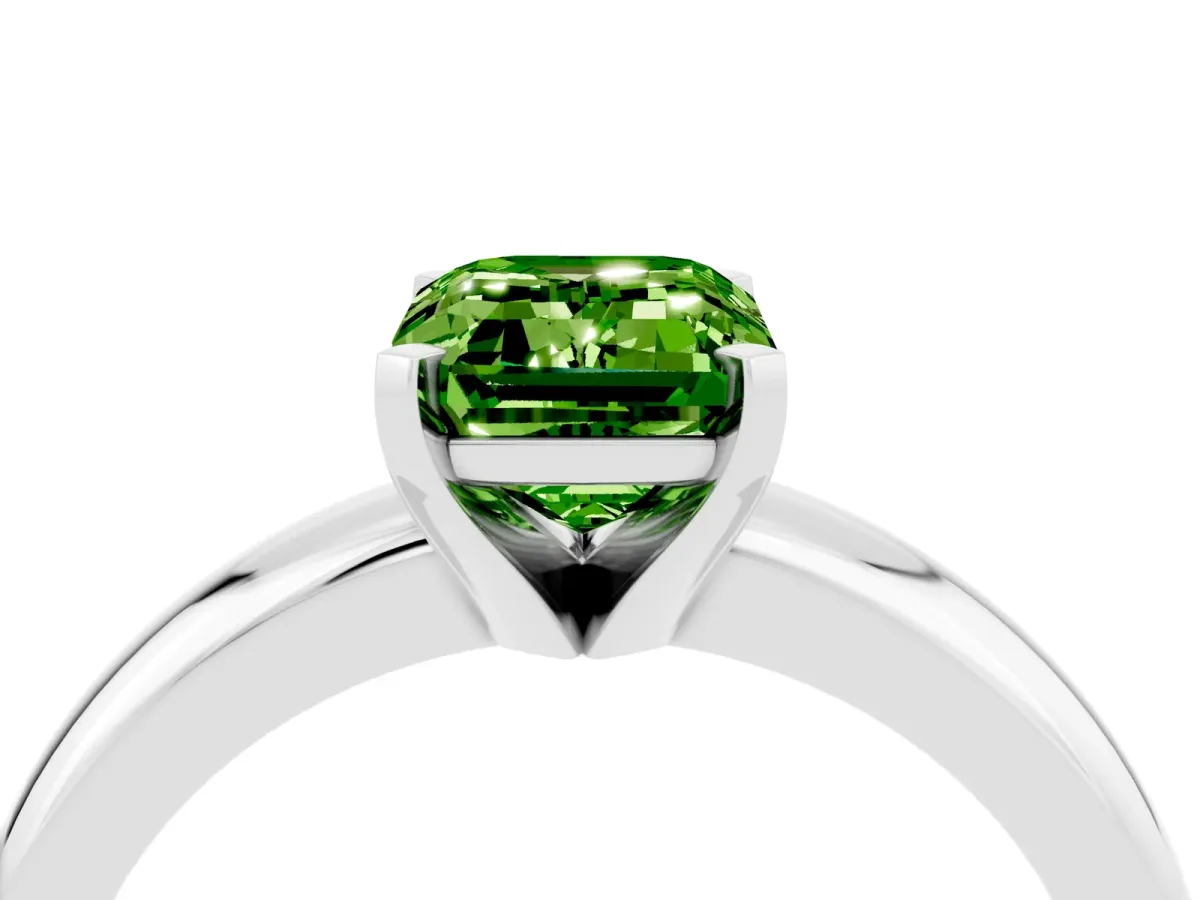 Emerald Cut Peridot Solitaire Engagement Ring with Round Band and Four-Prong Setting Silver