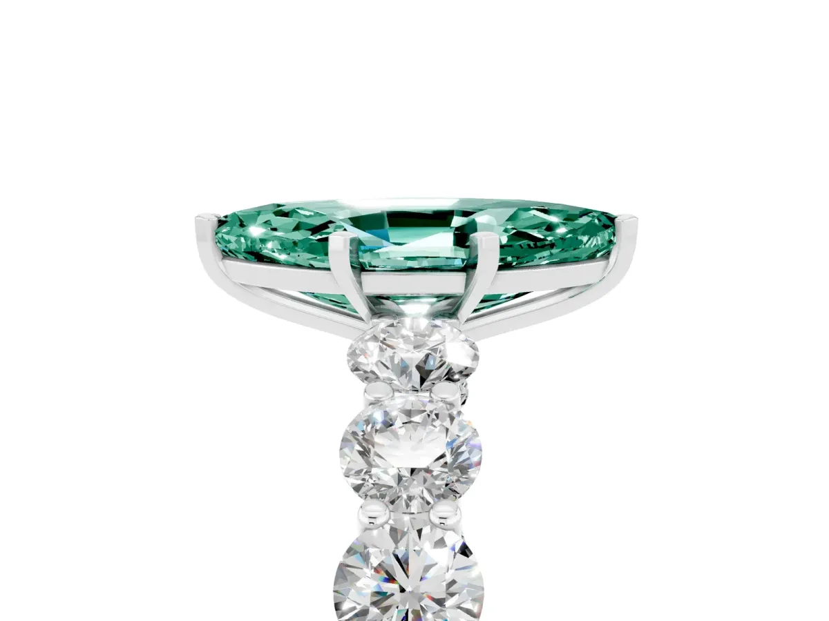 Marquise Cut Green Sapphire Prong Setting with Side Stones on a Pave Band Silver