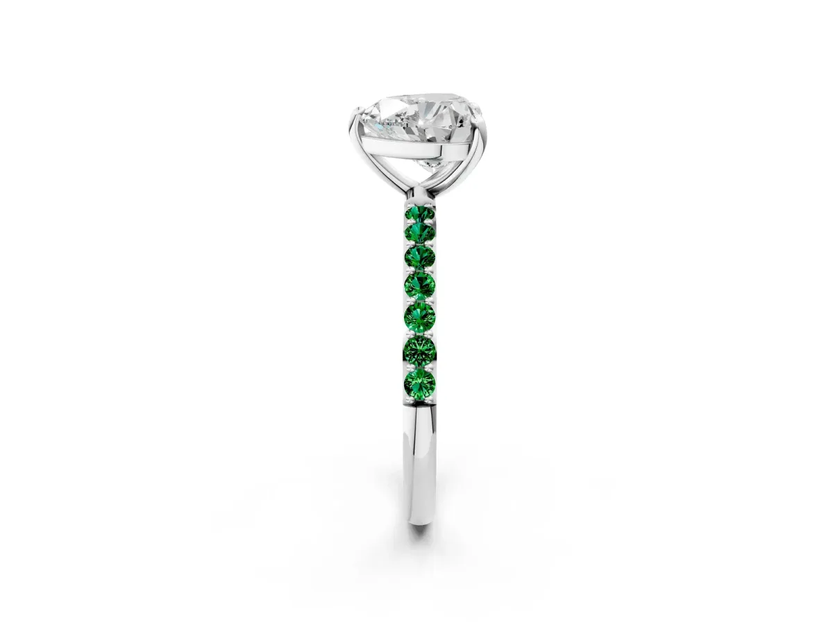 Heart Cut Diamond Solitaire Ring with Round Emerald Pavé Band and Prong Setting Silver