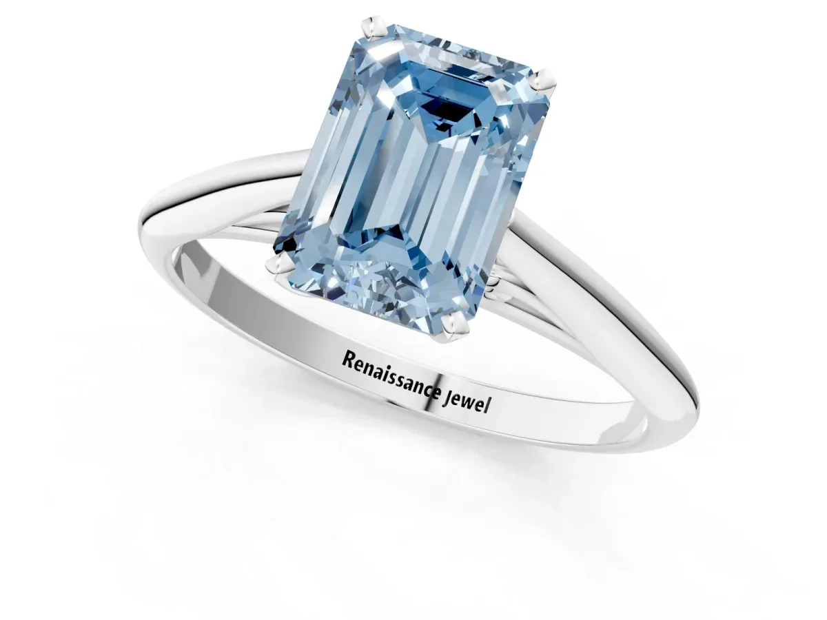 Fancy Blue Emerald Cut Diamond Solitaire Engagement Ring with Cathedral Setting and Four-Prong Mount White gold
