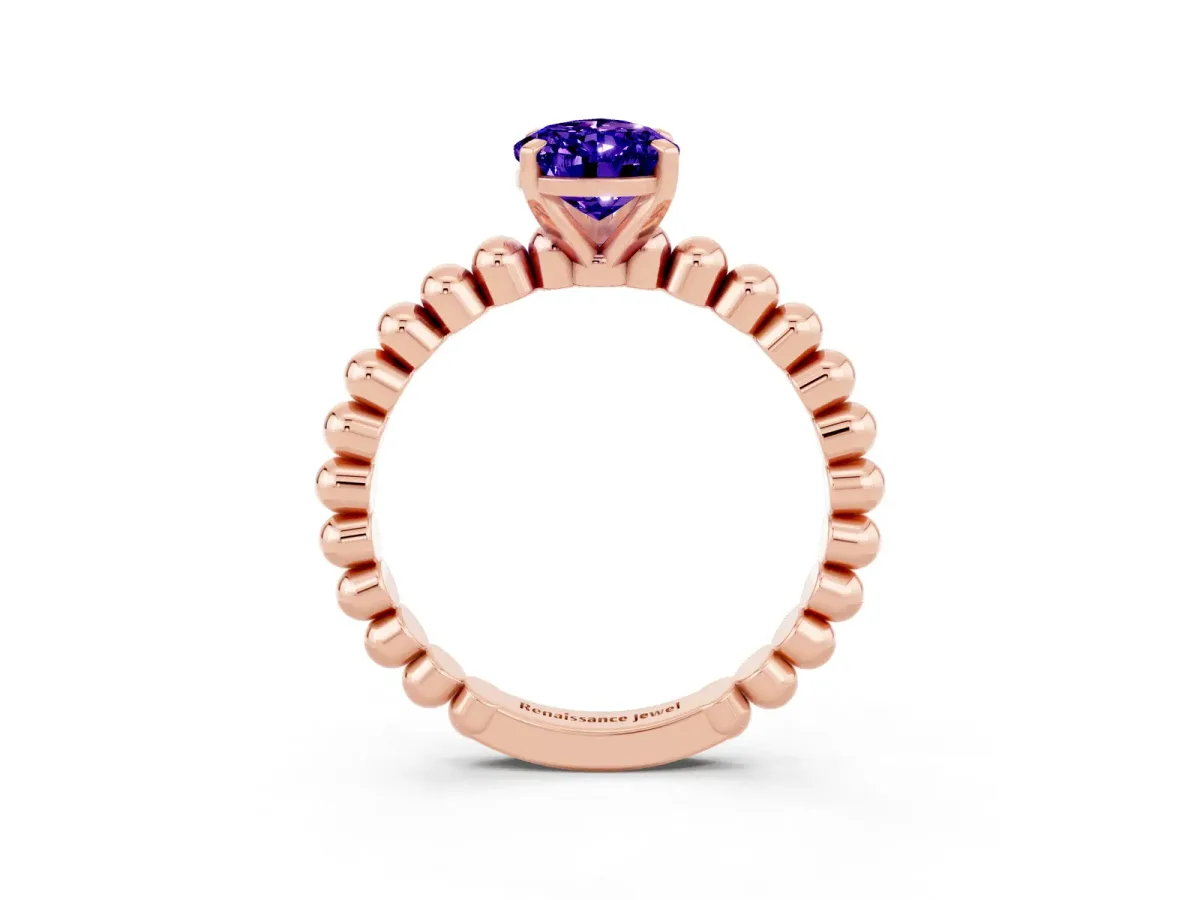 Pear Cut Tanzanite Solitaire Ring with Beaded Band and Prong Setting Rose gold