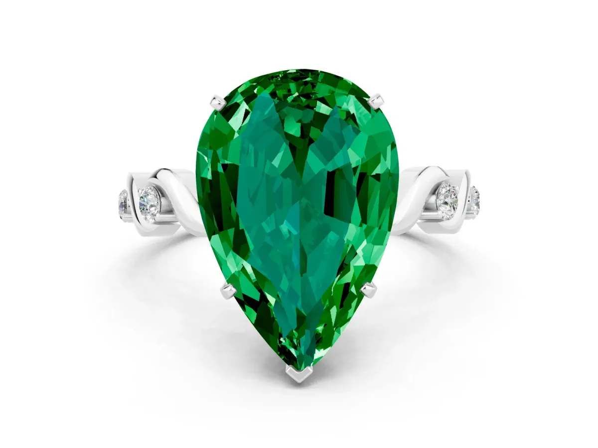 Pear Cut Emerald Solitaire Twisted Band with Round Accents and Prong Setting Silver