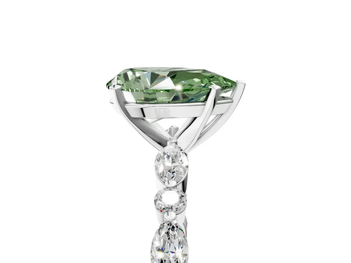 Fancy Green Pear Cut Diamond Ring with Marquise and Round Side Stones and Four-Prong Setting Silver