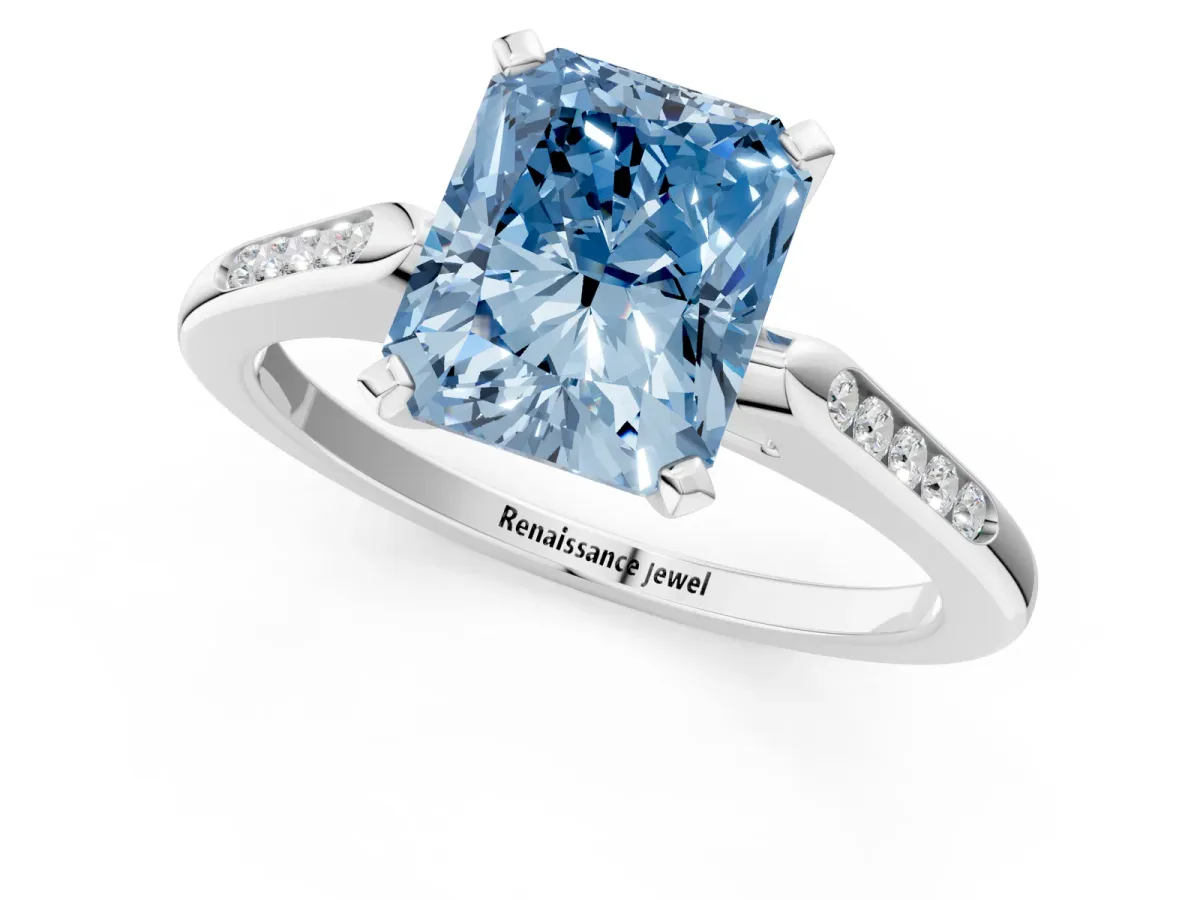 Fancy Blue Radiant Cut Diamond Solitaire Ring with Channel Set Round Band and Prong Setting Silver