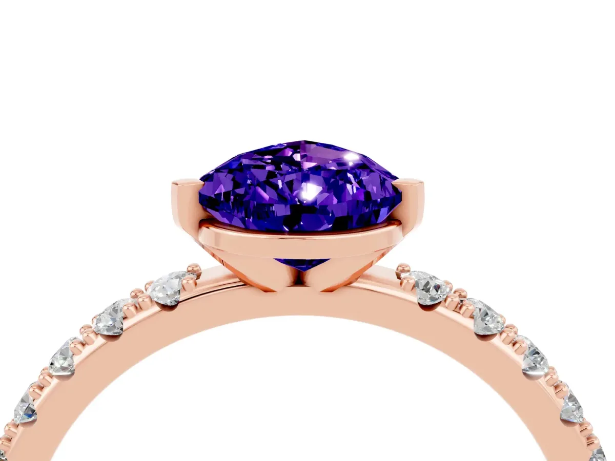 Pear Cut Tanzanite Solitaire Pavé Band with Four-Prong Setting Rose gold